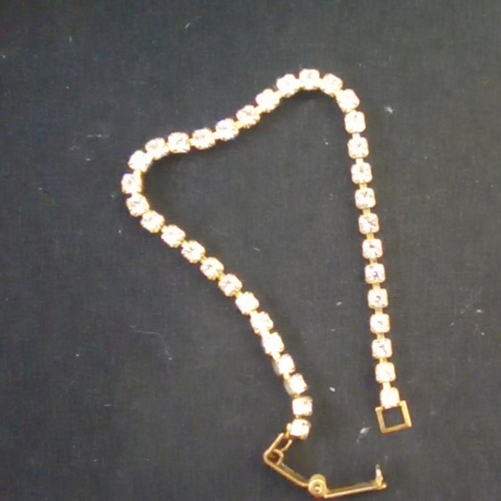 Gold tone clear rynstone bracelet